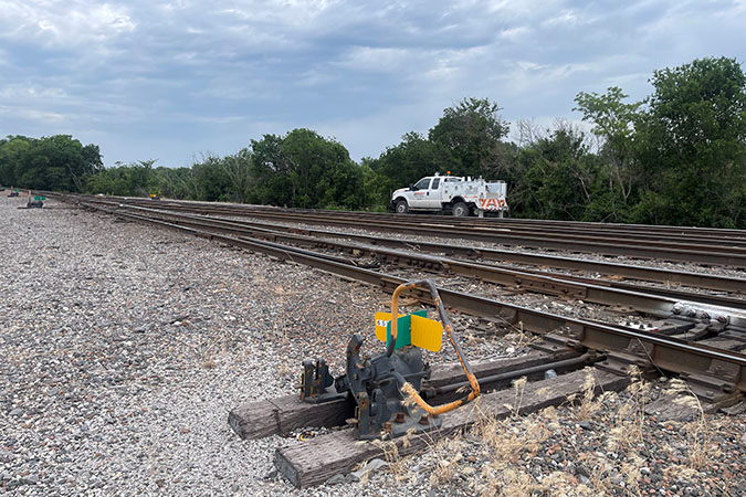 Switch with a hyrail vehicle in background